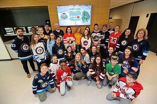 TREVOR HAGAN / WINNIPEG FREE PRESS
Students at College Beliveau wore green ribbons honouring the victims of the tragic Humboldt Broncos bush crash, Thursday, April 12, 2018. The school is fundraising in support of the GoFundMe.