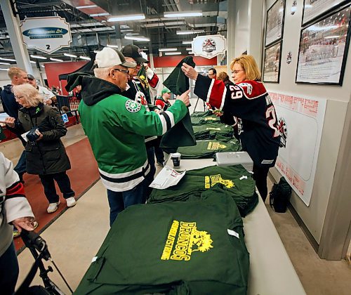 PHIL HOSSACK / WINNIPEG FREE PRESS -  MJHL fans purchase memorial t-shirts at the Virden Tundra Oil Gas Place  Thursday. Melissa Martin story.- April 12, 2018