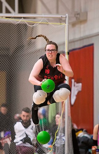 MIKAELA MACKENZIE / WINNIPEG FREE PRESS
Guylaine San Filippo, co-captain of Strike 1919, jumps to avoid a ball at the Canadian national team dodgeball trials at the Duckworth Centre in Winnipeg on Friday, April 13, 2018. 
Mikaela MacKenzie / Winnipeg Free Press 2018.