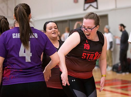 MIKAELA MACKENZIE / WINNIPEG FREE PRESS
Guylaine San Filippo, co-captain of Strike 1919, high fives the opposing team at the Canadian national team dodgeball trials at the Duckworth Centre in Winnipeg on Friday, April 13, 2018. 
Mikaela MacKenzie / Winnipeg Free Press 2018.