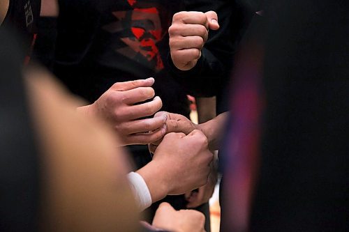 MIKAELA MACKENZIE / WINNIPEG FREE PRESS
The Red River Rebellion team huddles before a match at the Canadian national team dodgeball trials at the Duckworth Centre in Winnipeg on Friday, April 13, 2018. 
Mikaela MacKenzie / Winnipeg Free Press 2018.