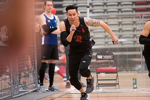 MIKAELA MACKENZIE / WINNIPEG FREE PRESS
Mike Garcia rushes for the balls at the Canadian national team dodgeball trials at the Duckworth Centre in Winnipeg on Friday, April 13, 2018. 
Mikaela MacKenzie / Winnipeg Free Press 2018.