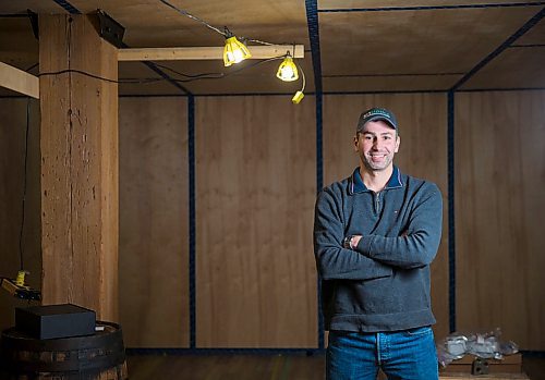 MIKAELA MACKENZIE / WINNIPEG FREE PRESS
Eric Bjornson poses in an unfinished floor model in Winnipeg on Friday, April 13, 2018. Bjornson has produced a high quality, inexpensive, air tight, low energy, environmentally friendly  home for northern Canada called Kithouse.
Mikaela MacKenzie / Winnipeg Free Press 2018.