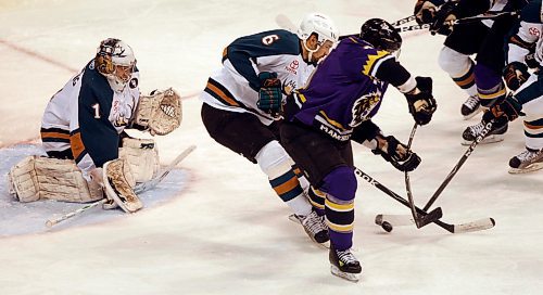 BORIS MINKEVICH / WINNIPEG FREE PRESS  081217 Moose goalie #1 Karl Goehring, moose #6 Daniel Rahimi, Manchester Monarchs #26 Paul Crostly.