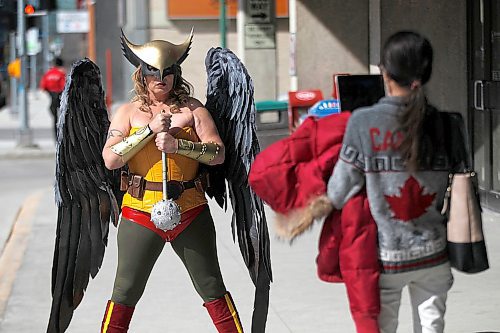 PHIL HOSSACK / WINNIPEG FREE PRESS - Comic-con Stand Up - The Justice League's "Hawk Woman" AKA Kristin Dubois, took a break from the gathering being held inside the RBC Convention Centre Saturday afternoon to pose outside for some photos with a friend and her tablet. Manitoba Comic Con, a bite-sized version of Central Canada Comic Con, is on at the convention centre from 10 a.m. to 6 p.m. Saturday and Sunday.Richard Brake, who plays the Night King (under makeup and prosthetics) on Game of Thrones, is doing autographs and pictures from 10:30 to noon both days.  - April 14, 2018

