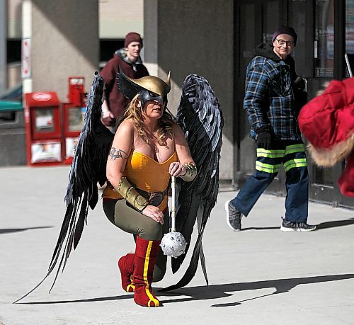 PHIL HOSSACK / WINNIPEG FREE PRESS - Comic-con Stand Up - The Justice League's "Hawk Woman" AKA Kristin Dubois, took a break from the gathering being held inside the RBC Convention Centre Saturday afternoon to pose outside for some photos with a friend and her tablet. Manitoba Comic Con, a bite-sized version of Central Canada Comic Con, is on at the convention centre from 10 a.m. to 6 p.m. Saturday and Sunday.Richard Brake, who plays the Night King (under makeup and prosthetics) on Game of Thrones, is doing autographs and pictures from 10:30 to noon both days.  - April 14, 2018
