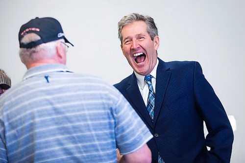 MIKAELA MACKENZIE / WINNIPEG FREE PRESS
Premier Brian Pallister says hello to people at a town hall on the proposed Lake Manitoba outlet in St. Laurent, Manitoba on Monday, April 16, 2018. 
Mikaela MacKenzie / Winnipeg Free Press 2018.