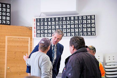 MIKAELA MACKENZIE / WINNIPEG FREE PRESS
Premier Brian Pallister says hello to people at a town hall on the proposed Lake Manitoba outlet in St. Laurent, Manitoba on Monday, April 16, 2018. 
Mikaela MacKenzie / Winnipeg Free Press 2018.