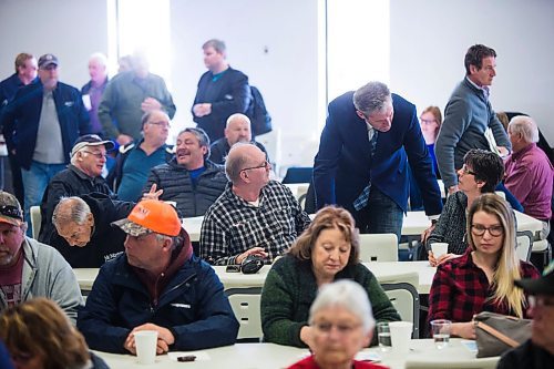 MIKAELA MACKENZIE / WINNIPEG FREE PRESS
Premier Brian Pallister says hello to people at a town hall on the proposed Lake Manitoba outlet in St. Laurent, Manitoba on Monday, April 16, 2018. 
Mikaela MacKenzie / Winnipeg Free Press 2018.