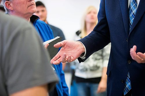 MIKAELA MACKENZIE / WINNIPEG FREE PRESS
Premier Brian Pallister talks to people at a town hall on the proposed Lake Manitoba outlet in St. Laurent, Manitoba on Monday, April 16, 2018. 
Mikaela MacKenzie / Winnipeg Free Press 2018.