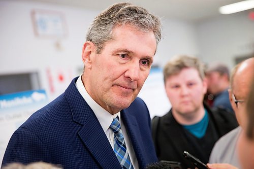 MIKAELA MACKENZIE / WINNIPEG FREE PRESS
Premier Brian Pallister scrums with the media at a town hall on the proposed Lake Manitoba outlet in St. Laurent, Manitoba on Monday, April 16, 2018. 
Mikaela MacKenzie / Winnipeg Free Press 2018.