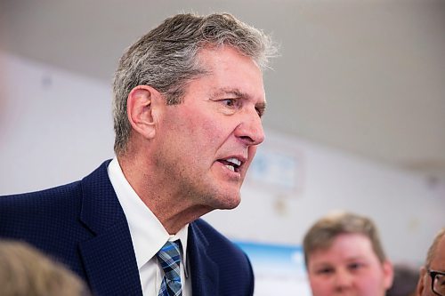 MIKAELA MACKENZIE / WINNIPEG FREE PRESS
Premier Brian Pallister scrums with the media at a town hall on the proposed Lake Manitoba outlet in St. Laurent, Manitoba on Monday, April 16, 2018. 
Mikaela MacKenzie / Winnipeg Free Press 2018.