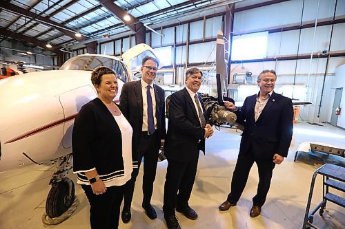RUTH BONNEVILLE / WINNIPEG FREE PRESS

Photo of GM Boeing Canada Winnipeg Kim Westenskow (far left), RRC CEO and President, Paul Vogt (tallest), Education Minister Ian Wishart and Thomas Kleysen (representing his dad, Hubert Kleysen)  at schools aviation college on Monday after press conference.   
The Province of Manitoba announced support for Red River College' by enabling them to purchase the Stevenson Aviation Campus at press conference held in the college's hangar with Education Minister, Ian Wishart and  RRC President, Paul Vogt Monday.  The landlord of Stevenson Aviation Campus, Hubert Kleysen, sold the property to the college which will not only help the college save money but allow for their aviation program to grow.

See story by Bill Redekop.
April 15,  2018
