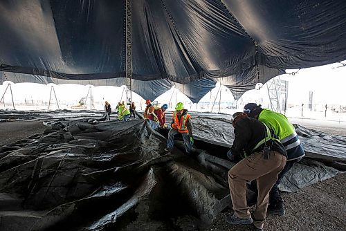 MIKE DEAL / WINNIPEG FREE PRESS
Crews work to raise the White Big Top at the Cavalia Odysseo site Tuesday morning.
180417 - Tuesday, April 17, 2018.
