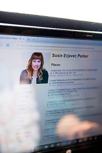 MIKAELA MACKENZIE / WINNIPEG FREE Susie Erjavec Parker, a social media specialist and owner of SPARKER Strategy Group, looks through her downloaded Facebook information in Winnipeg on Wednesday, April 18, 2018. 
Mikaela MacKenzie / Winnipeg Free Press 2018.