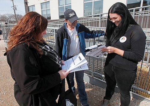 PHIL HOSSACK / WINNIPEG FREE PRESS -Street Census volunteers Barb Heinrichs and Brittany Odger survey Terry Land about his homelessness Wednesday. See Ryan's story. - April 18, 2018