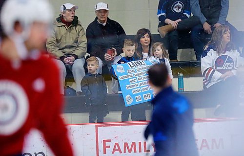 MIKAELA MACKENZIE / WINNIPEG FREE 
Caleb Friesen, six, holds a sign up for Patrick Laine during Jets practice at the MTS Iceplex in Winnipeg on Thursday, April 19, 2018.
Mikaela MacKenzie / Winnipeg Free Press 2018.