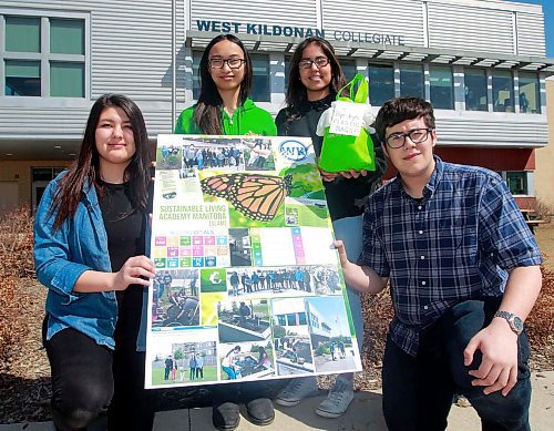 BORIS MINKEVICH / WINNIPEG FREE PRESS
From left, Tatiana Schwenzer, Christina Tran, Destiny Bushie, and Victor Selby pose with a poster and some plastic bags. The West Kildonan Collegiate grade 12 students have started an education campaign and petition trying to get the city of Winnipeg to ban single use plastic bags. Photo taken at the high school. DAVE BAXTER STORY. April 19, 2018