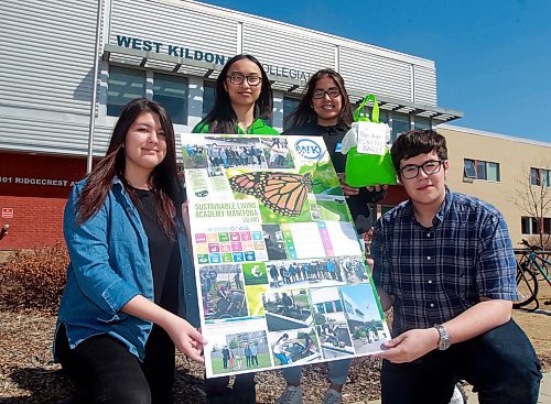 BORIS MINKEVICH / WINNIPEG FREE PRESS
From left, Tatiana Schwenzer, Christina Tran, Destiny Bushie, and Victor Selby pose with a poster and some plastic bags. The West Kildonan Collegiate grade 12 students have started an education campaign and petition trying to get the city of Winnipeg to ban single use plastic bags. Photo taken at the high school. DAVE BAXTER STORY. April 19, 2018