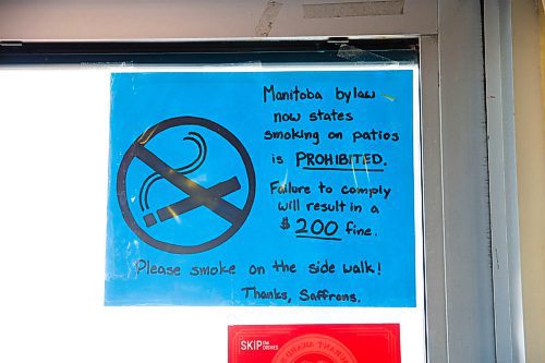 MIKAELA MACKENZIE / WINNIPEG FREE PRESS
John Kolevris, owner of Saffron's restaurant, is enforcing the smoking ban on his patio in Winnipeg on Thursday, April 19, 2018. The new patio smoking ban on took effect on April first, and both the establishment and the smoker could be fined $200.
Mikaela MacKenzie / Winnipeg Free Press 2018.