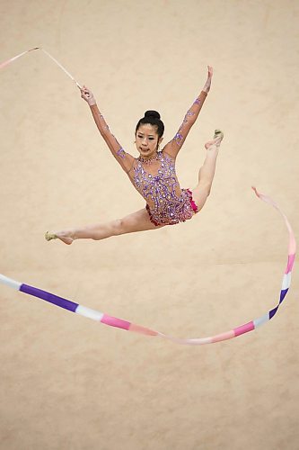 MIKE DEAL / WINNIPEG FREE PRESS
The Rhythmic Gymnastics 2018 Western Regional Championships at the Sport for Life Centre Friday afternoon.
Jenna Chan performs with ribbon for team Olympia.
180420 - Friday, April 20, 2018.