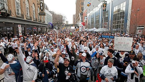 PHIL HOSSACK / WINNIPEG FREE PRESS - Jets fans flood downtown WInnipeg Friday evening for the Street Party and playoff game between the Winnipeg Jets and Minnesota Wild. - April 20, 2018