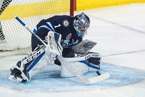 MIKE DEAL / WINNIPEG FREE PRESS
Manitoba Moose goaltender Eric Comrie (1) stops the puck in the first period against the Grand Rapids Griffins during the game 1 of the first round of the AHL playoffs at Bell MTS Place Saturday afternoon.
180421 - Saturday, April 21, 2018.