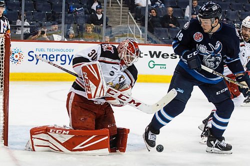 MIKE DEAL / WINNIPEG FREE PRESS
Manitoba Moose Brendan Lemieux looks to get the rebound against Grand Rapids Griffins goaltender Tom McCollum (30) during the second period of game 1 of the first round in the AHL playoffs at Bell MTS Place Saturday afternoon.
180421 - Saturday, April 21, 2018.