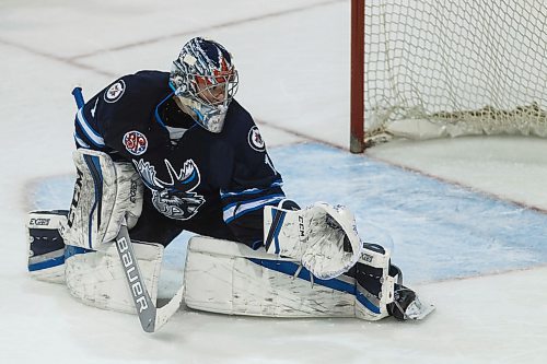 MIKE DEAL / WINNIPEG FREE PRESS
Manitoba Moose goaltender flashes the leather against the Grand Rapids Griffins during the third period of game 1 of the first round in the AHL playoffs at Bell MTS Place Saturday afternoon.
180421 - Saturday, April 21, 2018.