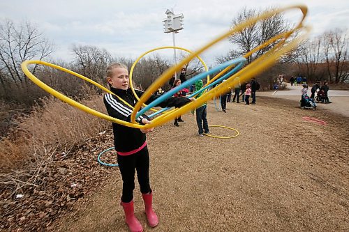 JOHN WOODS / WINNIPEG FREE PRESS
Kimberly Mason, 10, practices her hoop dancing and takes in the Earth Day activities at Fort Whyte Sunday, April 22, 2018.