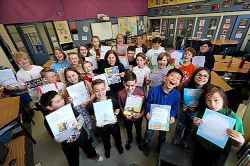 RUTH BONNEVILLE / WINNIPEG FREE PRESS

Brock Corydon grade 5 & 6 teacher Susan Pereles (centre) with class of students holding pages from their unique tourism guide book for Winnipeg, called  Winnerpeg that they created using  each letter of the alphabet to illustrate why Winnipeg is so awesome.

See Doug Speirs column 


April 23,  2018
