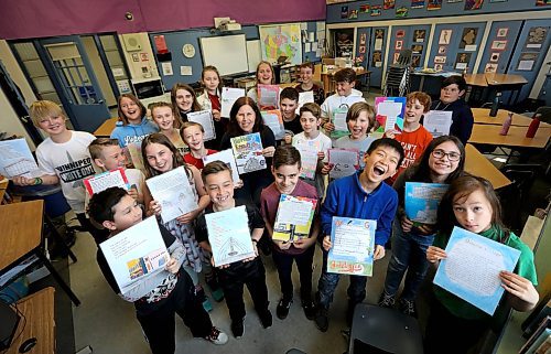 RUTH BONNEVILLE / WINNIPEG FREE PRESS

Brock Corydon grade 5 & 6 teacher Susan Pereles (centre) with class of students holding pages from their unique tourism guide book for Winnipeg, called  Winnerpeg that they created using  each letter of the alphabet to illustrate why Winnipeg is so awesome.

See Doug Speirs column 


April 23,  2018
