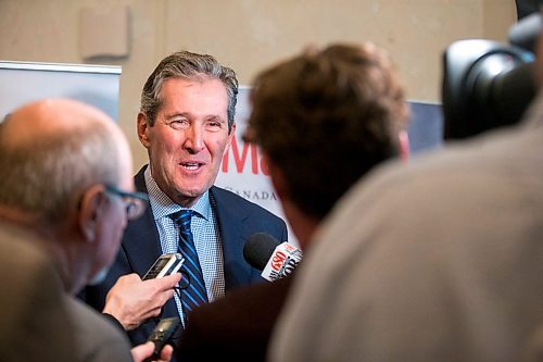 MIKAELA MACKENZIE / WINNIPEG FREE PRESS
Premier Brian Pallister scrums with the media at a Manitoba Chambers of Commerce event at the Delta in Winnipeg on Tuesday, April 24, 2018.
Mikaela MacKenzie / Winnipeg Free Press 2018.