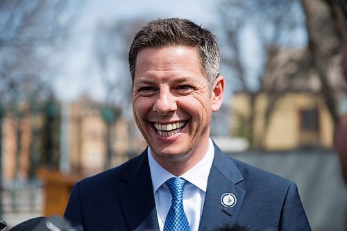 MIKAELA MACKENZIE / WINNIPEG FREE PRESS
Mayor Bowman scrums with the media on various topics after announcing funding to support a new foot patrol ambassador program for the Osborne Village neighbourhood in Winnipeg on Wednesday, April 25, 2018. 
Mikaela MacKenzie / Winnipeg Free Press 2018.