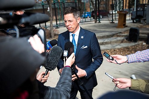 MIKAELA MACKENZIE / WINNIPEG FREE PRESS
Mayor Bowman scrums with the media on various topics after announcing funding to support a new foot patrol ambassador program for the Osborne Village neighbourhood in Winnipeg on Wednesday, April 25, 2018. 
Mikaela MacKenzie / Winnipeg Free Press 2018.