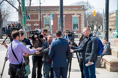 MIKAELA MACKENZIE / WINNIPEG FREE PRESS
Mayor Bowman scrums with the media on various topics after announcing funding to support a new foot patrol ambassador program for the Osborne Village neighbourhood in Winnipeg on Wednesday, April 25, 2018. 
Mikaela MacKenzie / Winnipeg Free Press 2018.