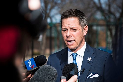 MIKAELA MACKENZIE / WINNIPEG FREE PRESS
Mayor Bowman scrums with the media on various topics after announcing funding to support a new foot patrol ambassador program for the Osborne Village neighbourhood in Winnipeg on Wednesday, April 25, 2018. 
Mikaela MacKenzie / Winnipeg Free Press 2018.