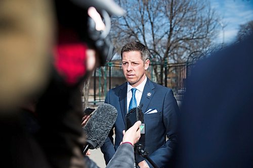 MIKAELA MACKENZIE / WINNIPEG FREE PRESS
Mayor Bowman scrums with the media on various topics after announcing funding to support a new foot patrol ambassador program for the Osborne Village neighbourhood in Winnipeg on Wednesday, April 25, 2018. 
Mikaela MacKenzie / Winnipeg Free Press 2018.