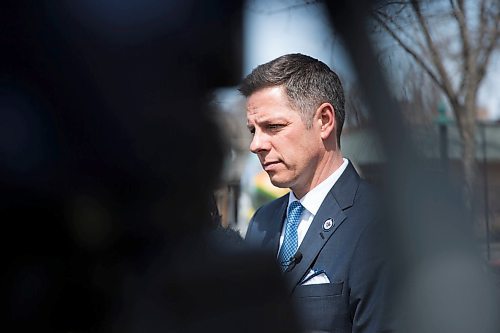 MIKAELA MACKENZIE / WINNIPEG FREE PRESS
Mayor Bowman scrums with the media on various topics after announcing funding to support a new foot patrol ambassador program for the Osborne Village neighbourhood in Winnipeg on Wednesday, April 25, 2018. 
Mikaela MacKenzie / Winnipeg Free Press 2018.