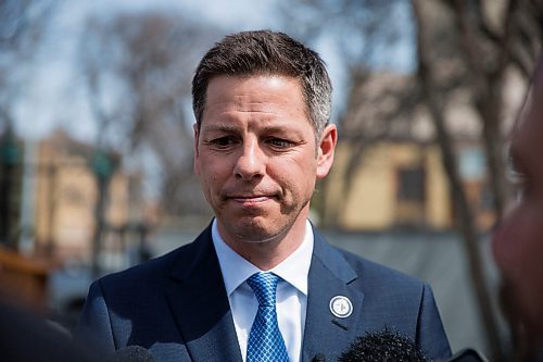 MIKAELA MACKENZIE / WINNIPEG FREE PRESS
Mayor Bowman scrums with the media on various topics after announcing funding to support a new foot patrol ambassador program for the Osborne Village neighbourhood in Winnipeg on Wednesday, April 25, 2018. 
Mikaela MacKenzie / Winnipeg Free Press 2018.