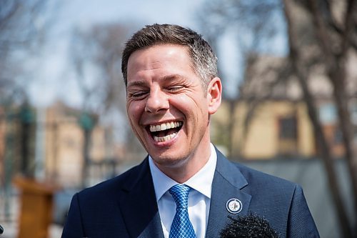 MIKAELA MACKENZIE / WINNIPEG FREE PRESS
Mayor Bowman scrums with the media on various topics after announcing funding to support a new foot patrol ambassador program for the Osborne Village neighbourhood in Winnipeg on Wednesday, April 25, 2018. 
Mikaela MacKenzie / Winnipeg Free Press 2018.