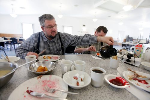 PHIL HOSSACK/Winnipeg Free Press - Jonny Hofer pours a second cup of coffee after lunch at the James Valley Colony after a communal lunch. One of the original Hutterite settlements in Manitoba the James Valley community celebrates it's 100th Anniversary this year.  -  April 24, 2018