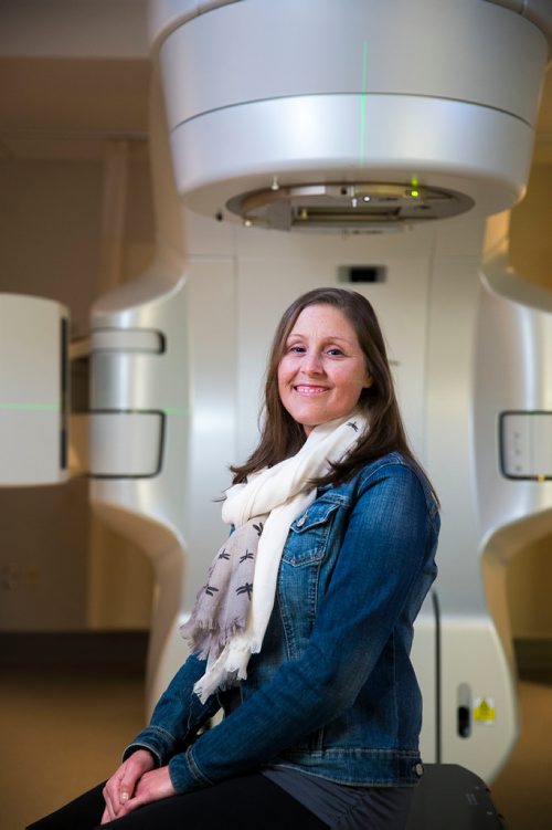 MIKAELA MACKENZIE / WINNIPEG FREE PRESS
Jennifer Dornbush, who is going through her second round with cancer, sits in front of the new linear accelerator after a treatment at the CancerCare clinic in Winnipeg on Wednesday, April 25, 2018. 
Mikaela MacKenzie / Winnipeg Free Press 2018.