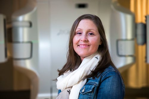 MIKAELA MACKENZIE / WINNIPEG FREE PRESS
Jennifer Dornbush, who is going through her second round with cancer, sits in front of the new linear accelerator after a treatment at the CancerCare clinic in Winnipeg on Wednesday, April 25, 2018. 
Mikaela MacKenzie / Winnipeg Free Press 2018.