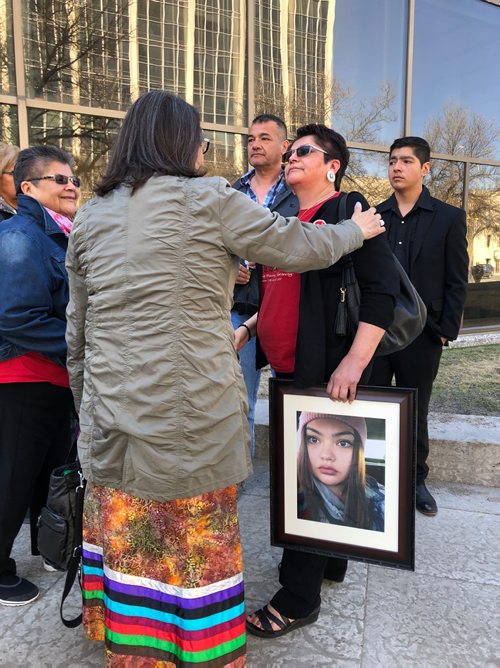 MELISSA MARTIN / WINNIPEG FREE PRESS
Surrounded by family and supporters, Dolores Daniels, the mother of Serena McKay, holds a photo of her daughter as she speaks outside court on Thursday. 
180426 - Thursday, April 26, 2018.