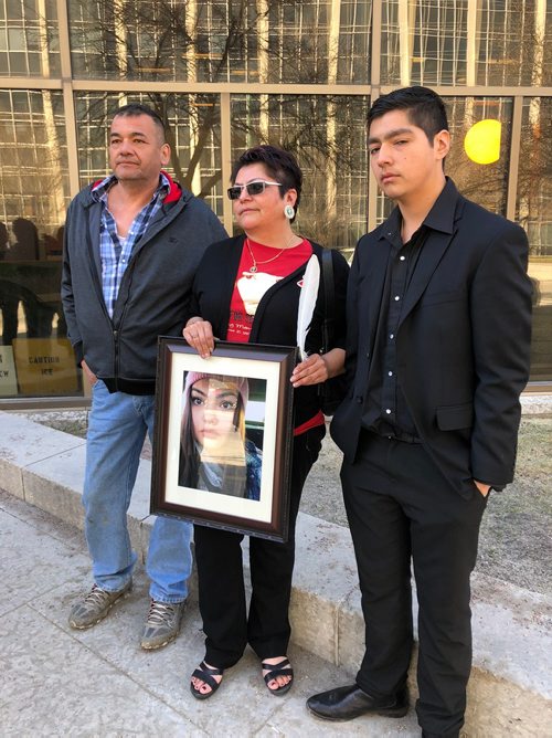 MELISSA MARTIN / WINNIPEG FREE PRESS
Surrounded by family and supporters, Dolores Daniels, the mother of Serena McKay, holds a photo of her daughter as she speaks outside court on Thursday. 
180426 - Thursday, April 26, 2018.