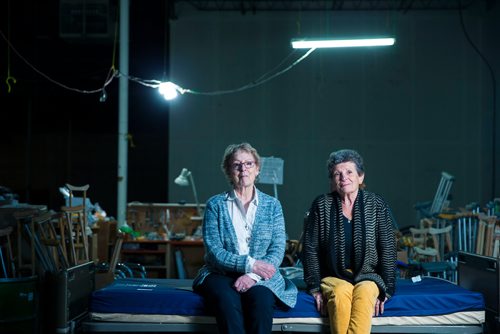 MIKAELA MACKENZIE / WINNIPEG FREE PRESS
Roma Maconachie (left) and Valerie McIntyre, longtime volunteers with International Hope, a nonprofit that provides medical supplies to impoverished countries, pose in the warehouse in Winnipeg on Thursday, April 26, 2018. 
Mikaela MacKenzie / Winnipeg Free Press 2018.