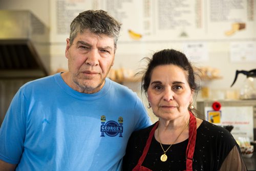 MIKAELA MACKENZIE / WINNIPEG FREE PRESS
Doros and Gina Metaxes, owners of George's Burgers & Subs, pose in the shop in Winnipeg on Thursday, April 26, 2018. They were given a mere month's notice after being in the location for 24 years.
Mikaela MacKenzie / Winnipeg Free Press 2018.