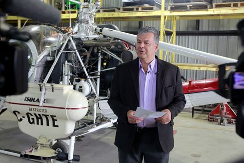 BORIS MINKEVICH / WINNIPEG FREE PRESS
City press conference on the update on insect control activities at Insect Control Branch Heliport  620 Tyne Avenue (3 Grey Street). Superintendent of Insect Control
Ken Nawolsky speaks to the media in the hanger with UH-12 Hiller chopper used by the department. NICHOLAS FREW STORY. April 27, 2018