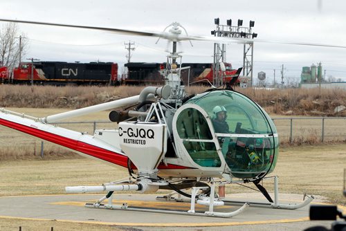 BORIS MINKEVICH / WINNIPEG FREE PRESS
City press conference on the update on insect control activities at Insect Control Branch Heliport  620 Tyne Avenue (3 Grey Street). Chopper pilot Thomas Humble at the controls of the UH-12 Hiller chopper used by the Winnipeg Insect Control Branch. NICHOLAS FREW STORY. April 27, 2018